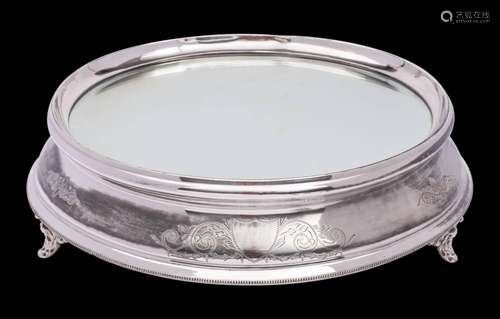 A silver plated cake stand: of large size and circular desig...