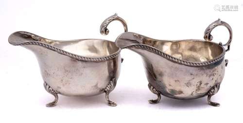 A pair of Edward VII silver sauceboats, maker William Aitken...