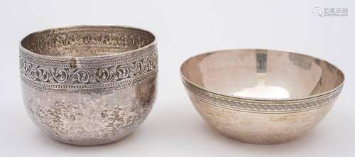 A Burmese silver circular bowl: with single band of scrollin...