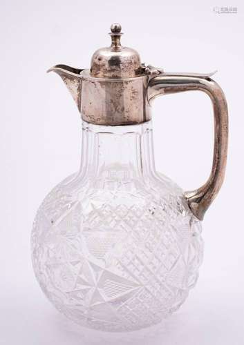 An Edward VII clear glass and silver mounted claret jug, mak...