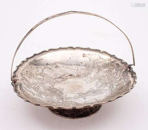 A Chinese circular swing handled comport, maker Cumwo,