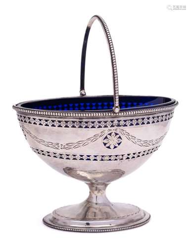 A George III silver swing handled pedestal sugar basket,