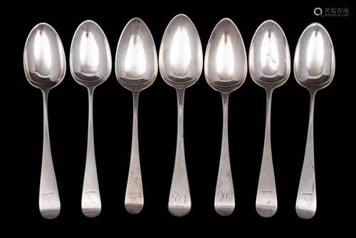 A matched set of seven silver Old English pattern dessert sp...