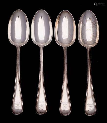 A set of four Victorian silver bead pattern tablespoons, mak...