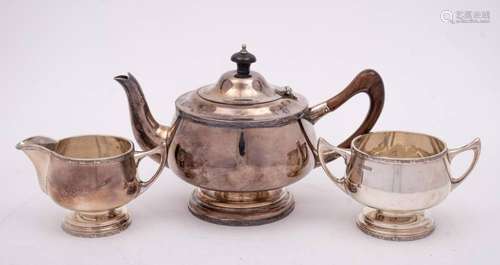 A George V silver three-piece circular tea service, maker Wa...