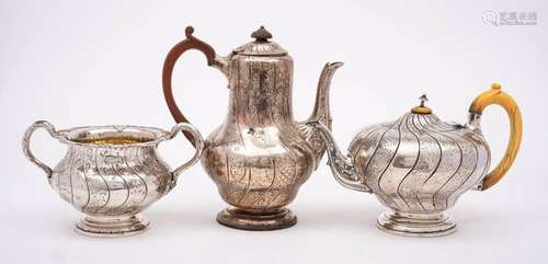 A Victorian silver part tea and coffee set, maker Robert Gar...