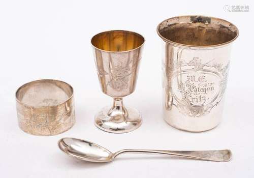 A German silver christening set, stamped marks: includes cup...