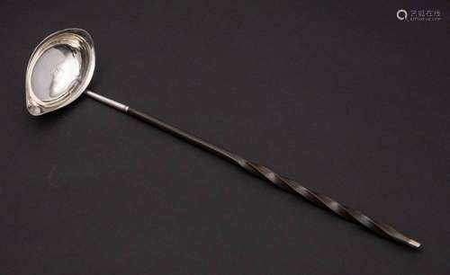 A late Georgian silver toddy ladle, unmarked: the oval bowl ...