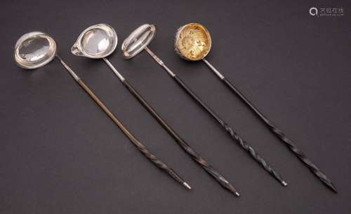 A group of four silver toddy ladles, all unmarked: with bale...