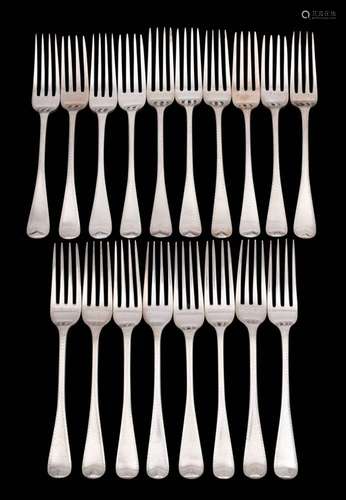 A matched set of eighteen silver table forks, various makers...