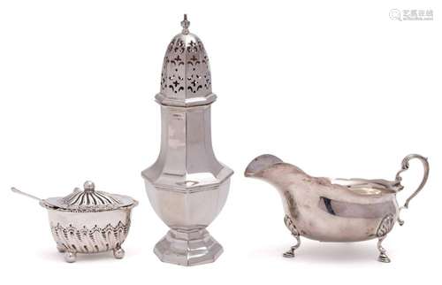 A mixed collection of silver wares: includes, a silver sauce...