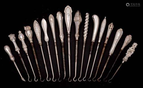 A collection of fifteen assorted small silver-handled button...