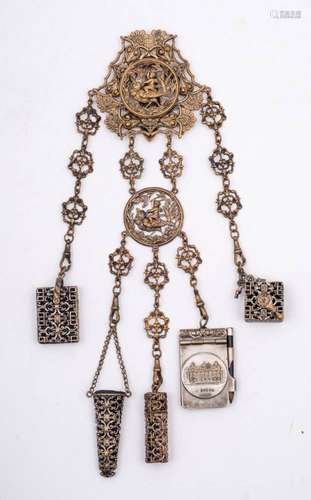 A late 19th century French gilded chatelaine: with pierced d...