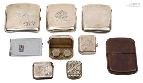 A mixed lot of silver and plated cigarette cases, vesta case...