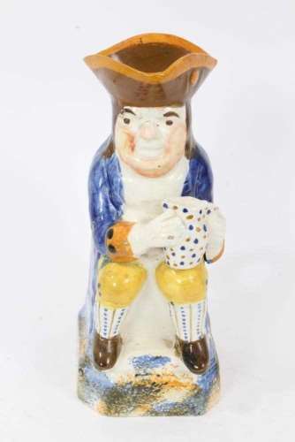 Prattware Toby jug, circa 1800, seated and holding frothing ...