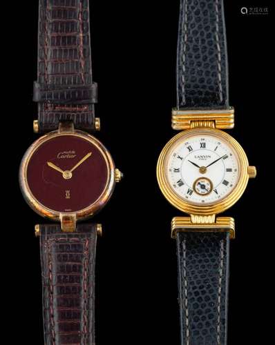 Cartier, Must de, a silver wristwatch,: the burgundy dial wi...