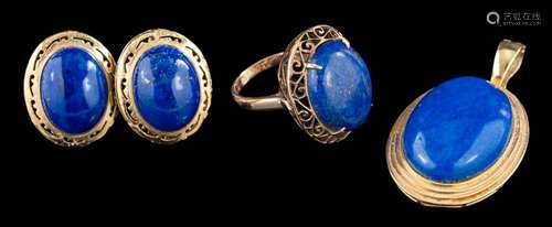 A lapis lazuli ring,: the oval cabochon lapis lazuli in a fo...