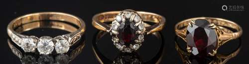 A 9 carat gold garnet ring,