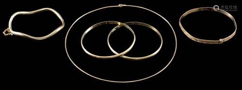 A gold coloured bangle,: the hinged bangle of waved design, ...