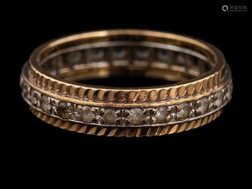 A 9 carat gold and diamond ring,: the band set with circular...