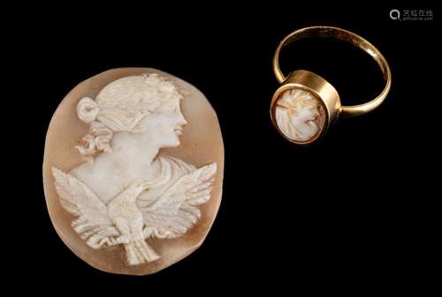 A shell cameo ring,: the oval shell cameo carved with a woma...