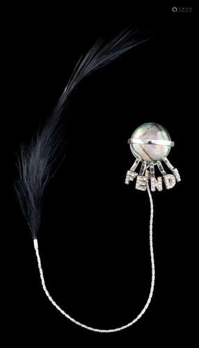 A paste and feather single earring by Fendi,: the black feat...