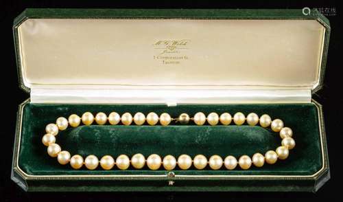 A golden cultured pearl necklace,