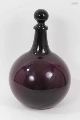 Antique aubergine glass pharmacy bottle and stopper