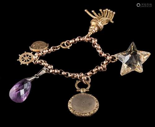 A gold charm bracelet: the faceted belcher links suspending ...