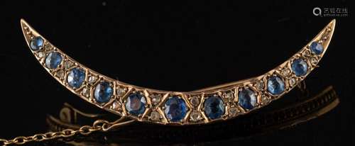 A sapphire and diamond crescent brooch:,