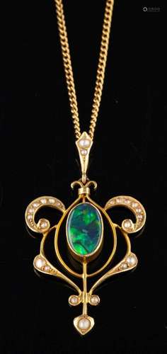 An Edwardian boulder opal doublet and seed pearl pendant,: c...