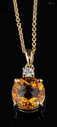 A citrine and diamond pendant,: the circular cut citrine in ...