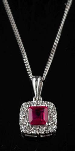 A platinum ruby and diamond pendant,