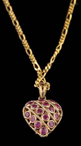 A ruby and sapphire pendant,: the heart shaped pendant set w...