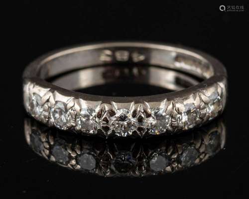 A diamond half eternity ring,: set with brilliant cut diamon...