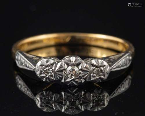 An 18 carat gold and diamond ring,: set with three eight-cut...