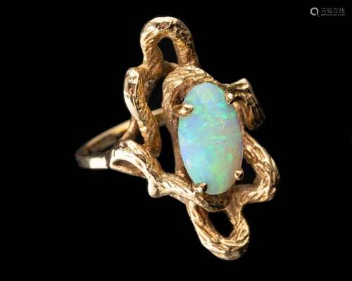 An opal ring,: the oval cabochon opal in a four claw setting...