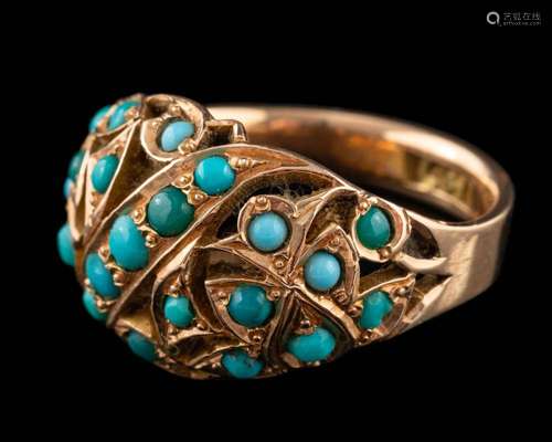 A gold coloured ring,: the openwork central section set with...