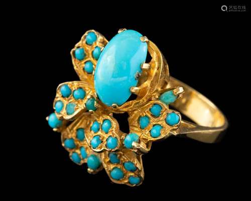 An Iranian turquoise ring,: the oval cabochon turquoise in a...