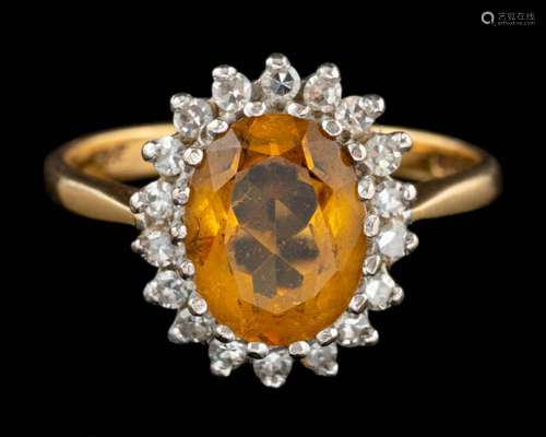 An 18 carat gold citrine and diamond ring,