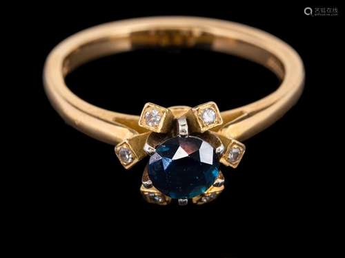 An 18 carat gold sapphire and diamond ring,