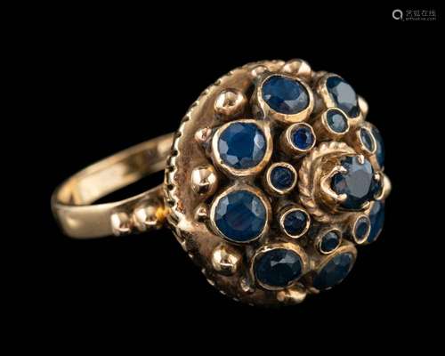 A sapphire dress ring,: set with a cluster of circular cut s...