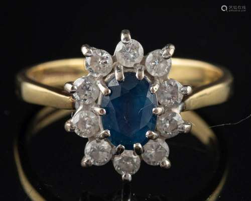 An 18 carat gold sapphire and diamond ring,