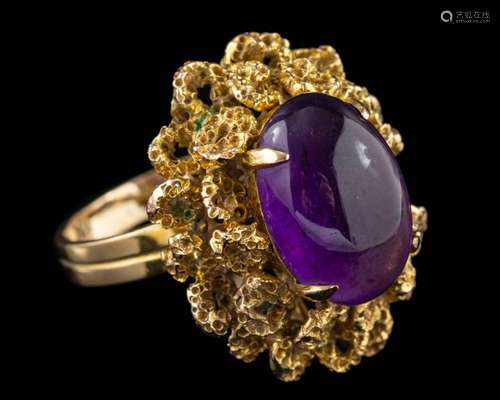 An amethyst dress ring,: the oval cabochon amethyst in a fou...