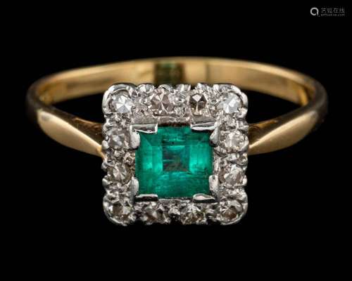 An emerald and diamond ring,