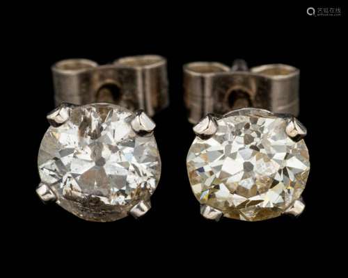 A pair of diamond ear studs,: each set with an old brilliant...