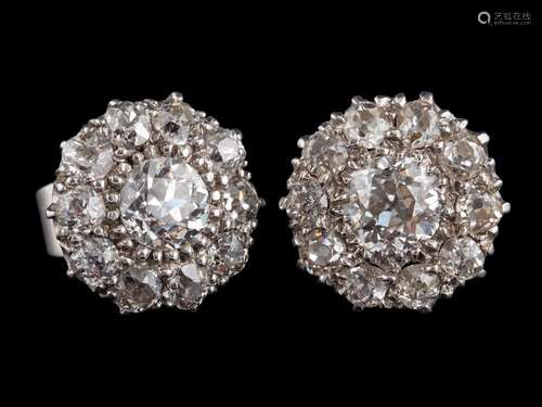 A pair of diamond cluster earrings,: the central old brillia...