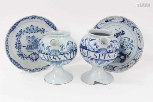 Two 18th century English blue and white delft wet drug jars,...