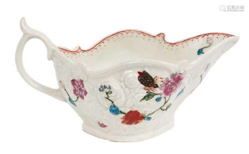 A Worcester moulded sauce boat, painted with the May-Bug pat...