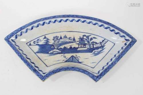 A Bow crescent shaped dish, painted in blue in Chinese style...